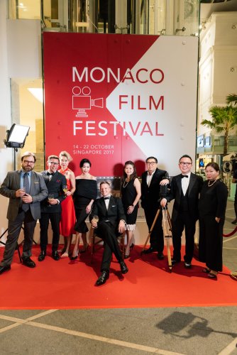 benoit-badufle-seated-with-guests-of-the-monaco-film-festival.jpg