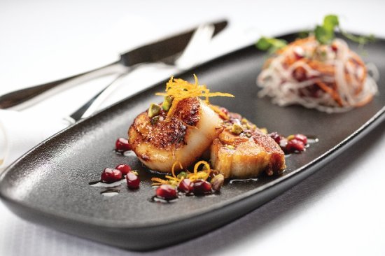 seared-diver-scallop-cured-pork-belly-confit-orange-pomegranate-sauce.jpg