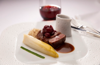 veal-rack-loin-caramelized-endive-grape-chutney-walnut-veal-jus-sauce.png