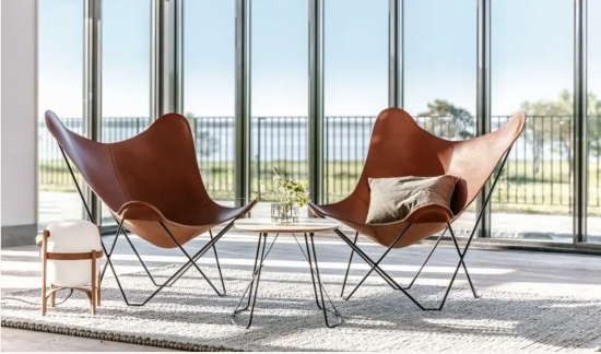 a-pair-of-leather-butterfly-chairs.png