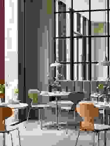 ant-chair-front-upholstered-with-circular-table.jpg